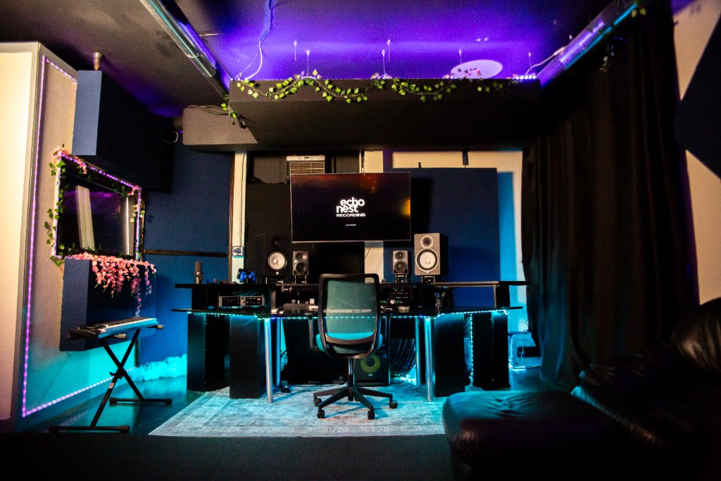 The control room under teal LED lighting