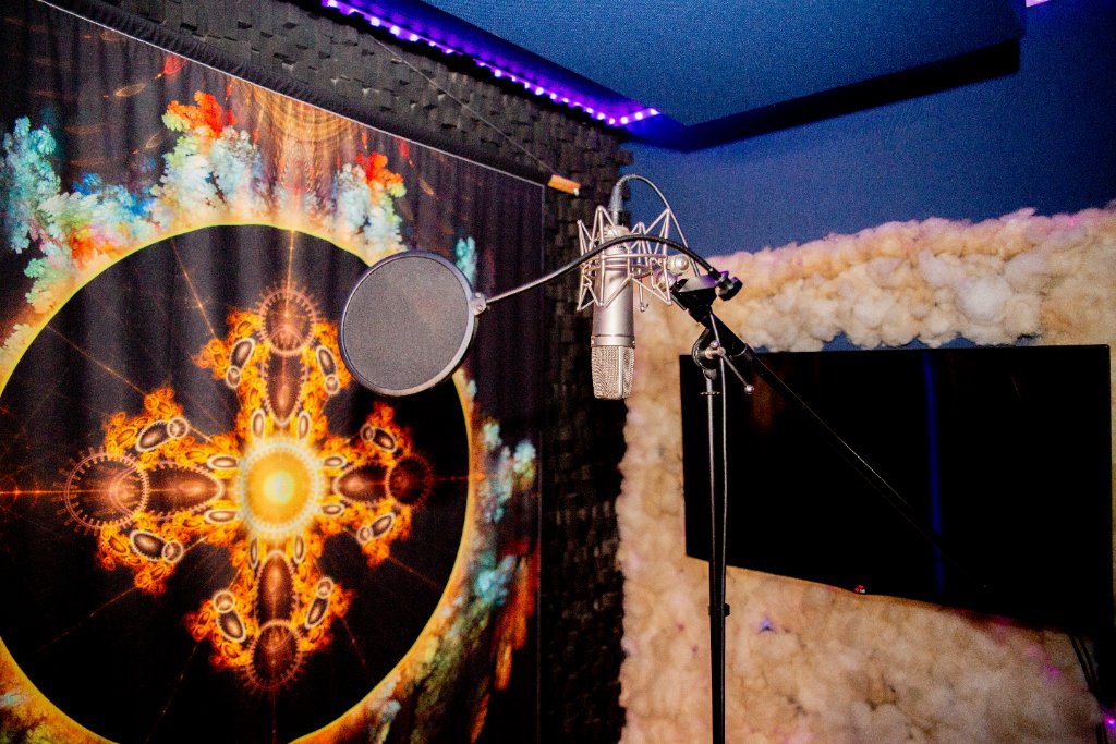 Booth microphone against a colourful backdrop