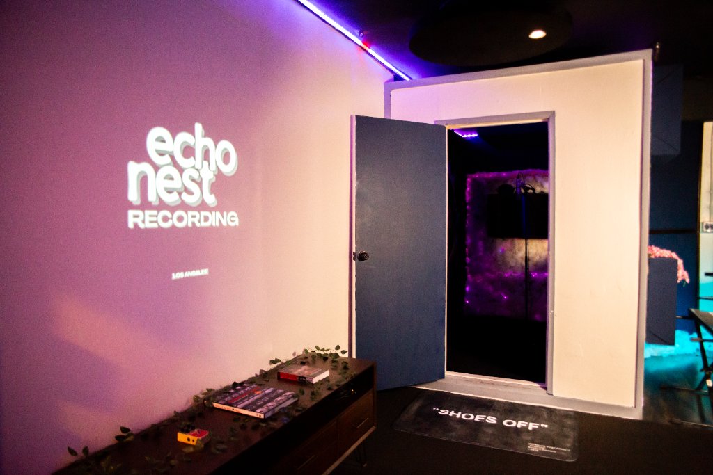 The booth door with the recording room behind it