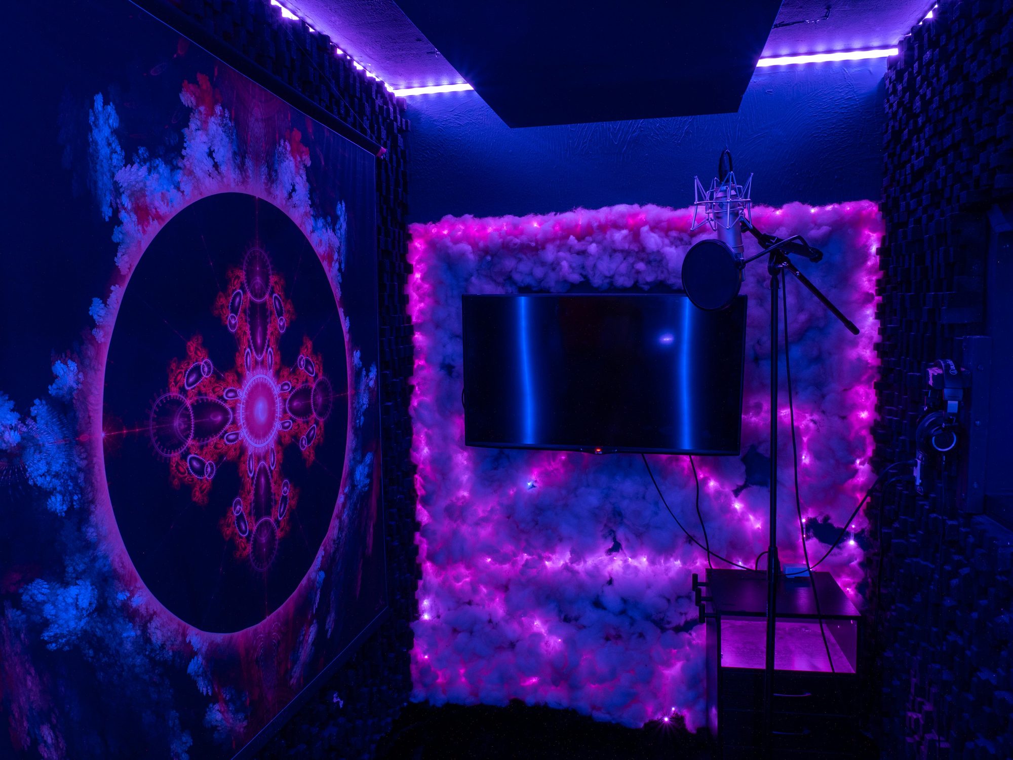Microphone stand in front of the mandala wall hanging